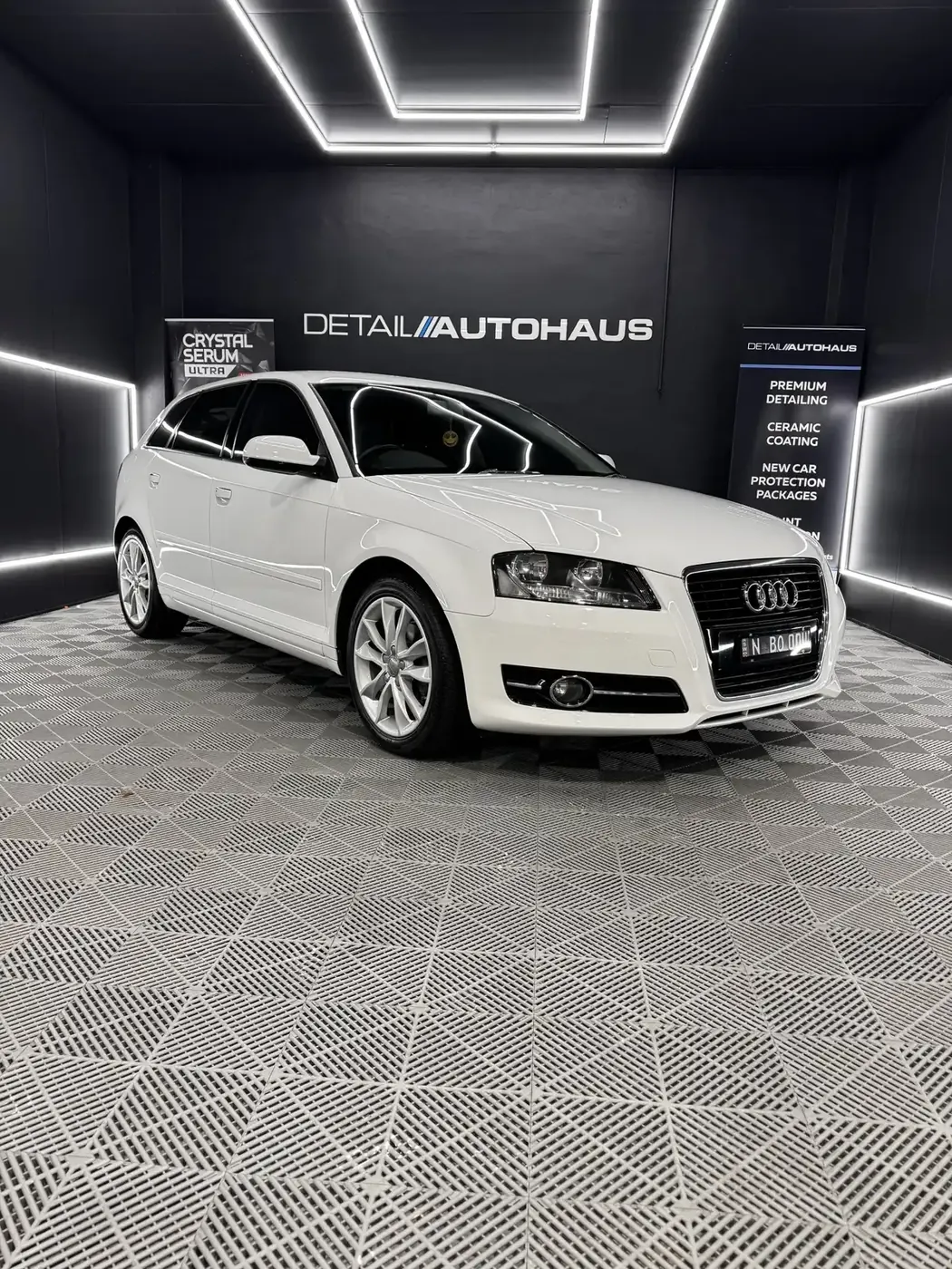 The white Audi A3 loan car in the Detail AutoHaus studio
