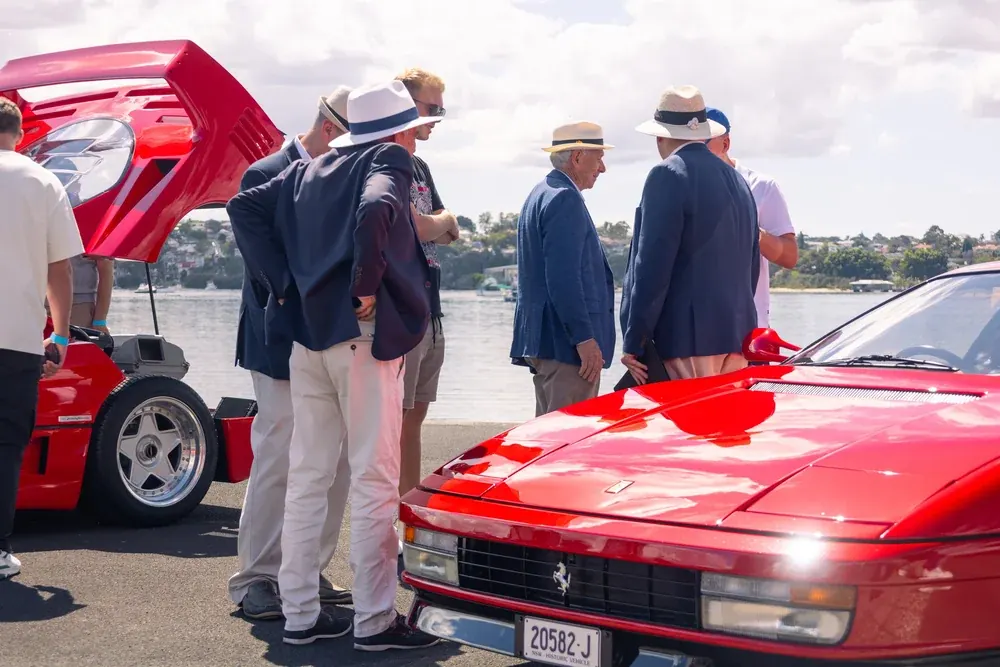 A red Ferrari on show at a concours